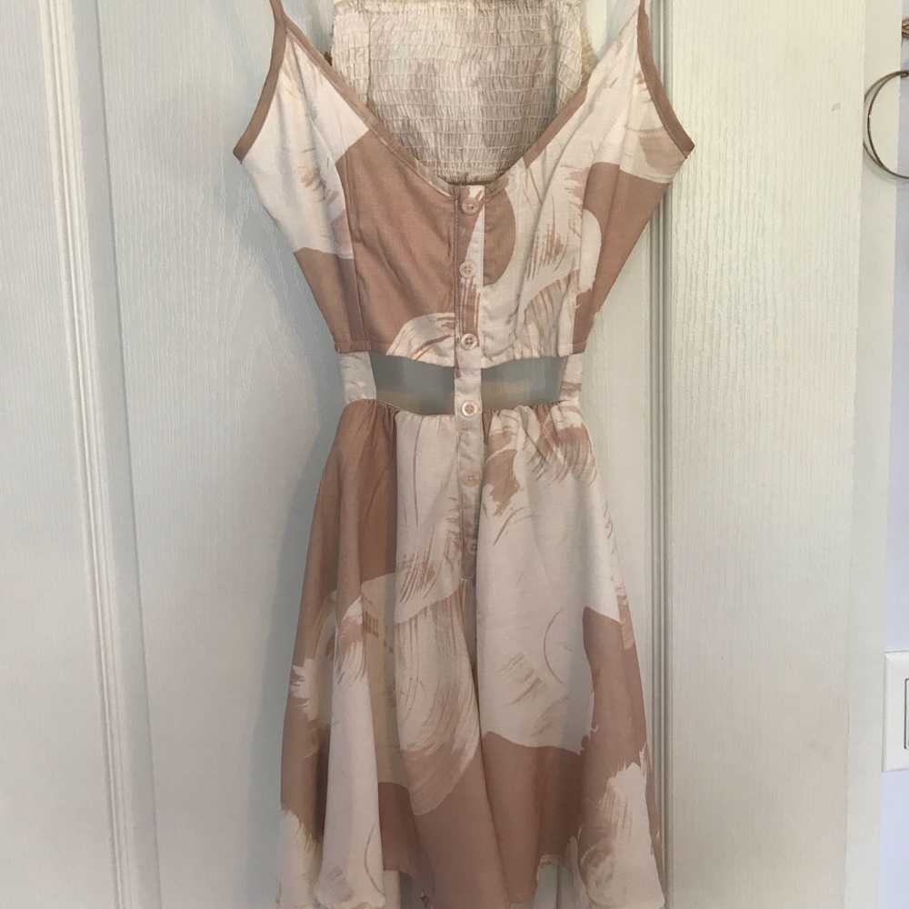 Tan and white open back romper